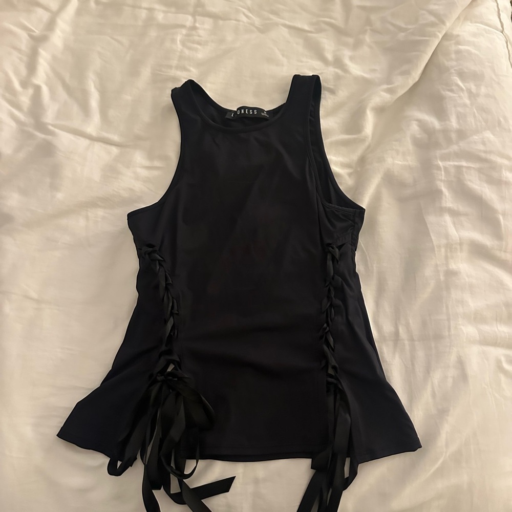 Black going out top